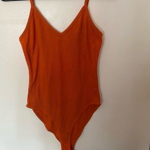 Orange spaghetti strap body suit